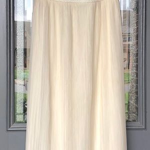 Ivory wedding gown with ivory beading